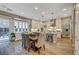 Modern kitchen features white shaker cabinets, quartz countertops, and stainless steel appliances at 821 Barrhead Ave, Henderson, NV 89012