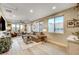 Spacious living area with sectional sofa and hardwood floors at 821 Barrhead Ave, Henderson, NV 89012