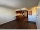 Open concept living room, kitchen featuring wood-look flooring and natural light at 855 Del Rey Dr, Boulder City, NV 89005