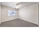 Bright bedroom with ceiling fan and neutral carpeting at 86 Myrtle Beach Dr, Henderson, NV 89074