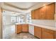 Bright kitchen with light wood cabinets and white appliances at 86 Myrtle Beach Dr, Henderson, NV 89074