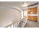 Upstairs hallway with built-in wooden cabinets at 86 Myrtle Beach Dr, Henderson, NV 89074