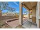 Covered patio with brick pavers and a small landscaped area at 8658 Tom Noon Ave # 103, Las Vegas, NV 89178