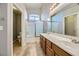 Elegant bathroom with dual sinks, soaking tub, and separate shower at 8658 Tom Noon Ave # 103, Las Vegas, NV 89178