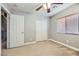 Bright bedroom with carpet flooring, double door closet and neutral wall paint at 8658 Tom Noon Ave # 103, Las Vegas, NV 89178