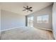 Spacious bedroom with carpet flooring and access to balcony at 8658 Tom Noon Ave # 103, Las Vegas, NV 89178