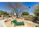 Community park with shaded seating and desert landscaping at 8658 Tom Noon Ave # 103, Las Vegas, NV 89178