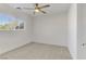 Simple bedroom with carpet flooring and a window with blinds at 9570 Wenmarie Ct, Las Vegas, NV 89148