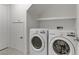 Clean laundry room with washer and dryer at 9570 Wenmarie Ct, Las Vegas, NV 89148