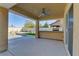 Covered patio with built-in grill and pool view at 9570 Wenmarie Ct, Las Vegas, NV 89148