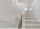 Modern light-colored interior staircase at 9570 Wenmarie Ct, Las Vegas, NV 89148