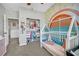 Bright Bedroom with built-in closet and whimsical wall mural at 988 Via Panfilo Ave, Henderson, NV 89011