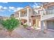 Front view of the home with a courtyard entry at 988 Via Panfilo Ave, Henderson, NV 89011