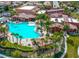 Community pool with surrounding landscaping and clubhouse at 988 Via Panfilo Ave, Henderson, NV 89011