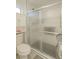 Bathroom with a shower and toilet at 9900 Rosamond Dr, Las Vegas, NV 89134