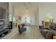 Bright living room featuring hardwood floors and comfy seating at 9900 Rosamond Dr, Las Vegas, NV 89134