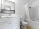 Bathroom with white vanity, bathtub and shower at 1008 Willow Tree Dr # B, Las Vegas, NV 89128