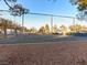 Community tennis court with chain-link fence at 1008 Willow Tree Dr # B, Las Vegas, NV 89128