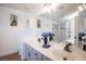 Elegant bathroom with dual sinks and a large shower at 1015 Aspen Breeze Ave, Las Vegas, NV 89123