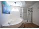 Relaxing bathroom with soaking tub and walk-in shower at 1015 Aspen Breeze Ave, Las Vegas, NV 89123