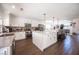 Modern kitchen with white cabinets and large island at 1015 Aspen Breeze Ave, Las Vegas, NV 89123