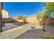 Spacious backyard with gravel, patio, and desert landscaping at 10260 Danskin Dr, Las Vegas, NV 89166