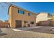 Backyard view of home with patio, grill, and gravel landscaping at 10260 Danskin Dr, Las Vegas, NV 89166