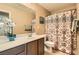 Bathroom with patterned shower curtain and vanity at 10260 Danskin Dr, Las Vegas, NV 89166