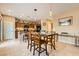 Kitchen with breakfast nook and view into Gathering room at 10260 Danskin Dr, Las Vegas, NV 89166