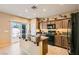 Modern kitchen with granite countertops and stainless steel appliances at 10260 Danskin Dr, Las Vegas, NV 89166