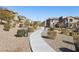 Curved path through landscaped community grounds at 104 Alamere Falls Dr, Las Vegas, NV 89138