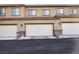 Two-car garage with attached units and ample parking at 104 Alamere Falls Dr, Las Vegas, NV 89138