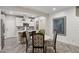 Modern kitchen with white cabinets and marble countertops at 104 Alamere Falls Dr, Las Vegas, NV 89138