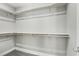 Spacious walk-in closet with ample shelving and hanging rods at 104 Alamere Falls Dr, Las Vegas, NV 89138