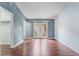 Bedroom with hardwood floors, French doors, and neutral paint at 109 Ayesha Ln, Henderson, NV 89074