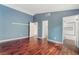 Bedroom with hardwood floors, and access to an en-suite bathroom at 109 Ayesha Ln, Henderson, NV 89074