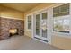 Relaxing patio with fireplace and French doors at 11280 Granite Ridge Dr # 1044, Las Vegas, NV 89135