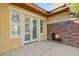 Stone fireplace and French doors highlight this inviting patio at 11280 Granite Ridge Dr # 1044, Las Vegas, NV 89135