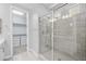 Bathroom featuring a large glass shower and closet at 11857 Corenzio Ave, Las Vegas, NV 89138