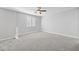 Bright bedroom featuring a ceiling fan and carpet at 11857 Corenzio Ave, Las Vegas, NV 89138