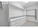 Large walk-in closet with ample shelving and drawers at 11857 Corenzio Ave, Las Vegas, NV 89138