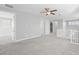 Spacious loft showcasing a ceiling fan and carpet at 11857 Corenzio Ave, Las Vegas, NV 89138