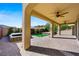 Large covered patio with hot tub and ceiling fans at 11857 Corenzio Ave, Las Vegas, NV 89138