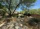 Stone pathway leads to a spacious grassy backyard at 1327 Coulisse St, Henderson, NV 89052