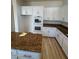 Bright kitchen with granite countertops and white cabinets at 1327 Coulisse St, Henderson, NV 89052