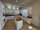 Spacious kitchen with granite countertops and island at 1327 Coulisse St, Henderson, NV 89052