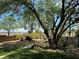 Landscaped backyard with a wooden bridge and rock pathway at 1327 Coulisse St, Henderson, NV 89052