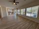 Open living room with kitchen and pool views at 1327 Coulisse St, Henderson, NV 89052