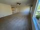 Spacious living room with high ceilings and neutral carpeting at 1327 Coulisse St, Henderson, NV 89052