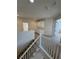 Upstairs hall with built-in storage and staircase at 1327 Coulisse St, Henderson, NV 89052